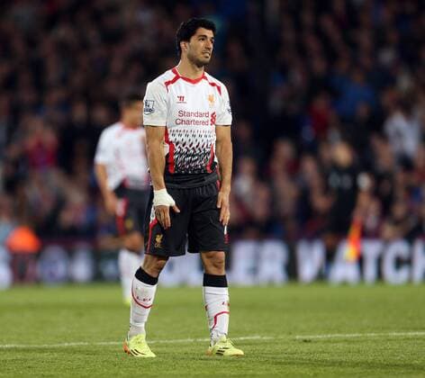 Liverpool s Luis Suarez looks on dejected at the final whistle Crystal Palace vs Liverpool - Barclays Premier League - Selhurst Park - London - UK - 05 05 2014 - Pic David Klein Sportimage EDITORIAL USE ONLY. No use with unauthorised audio, video, data, fixture lists, club league logos or live services. Online in-match use limited to 120 images, no video emulation. No use in betting, games or single club league player publications.