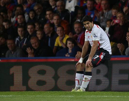 Liverpool s Luis Suarez looks on dejected Crystal Palace vs Liverpool - Barclays Premier League - Selhurst Park - London - UK - 05 05 2014 - Pic David Klein Sportimage EDITORIAL USE ONLY. No use with unauthorised audio, video, data, fixture lists, club league logos or live services. Online in-match use limited to 120 images, no video emulation. No use in betting, games or single club league player publications.