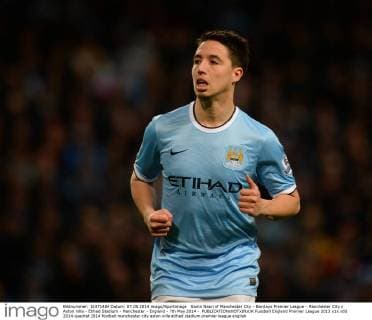 Samir Nasri of Manchester City - Barclays Premier League - Manchester City v Aston Villa - Etihad Stadium - Manchester - England - 7th May 2014 - EDITORIAL USE ONLY. No use with unauthorised audio, video, data, fixture lists, club league logos or live services. Online in-match use limited to 120 images, no video emulation. No use in betting, games or single club league player publications.