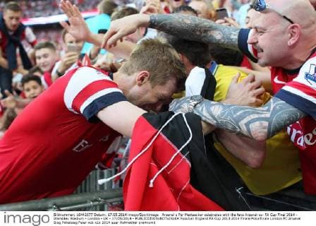 Arsenal s Per Mertsacker celebrates with the fans Arsenal vs- FA Cup Final 2014 - Wembley Stadium - London - UK - 17 05 2014 - EDITORIAL USE ONLY. No use with unauthorised audio, video, data, fixture lists, club league logos or live services. Online in-match use limited to 120 images, no video emulation. No use in betting, games or single club league player publications.