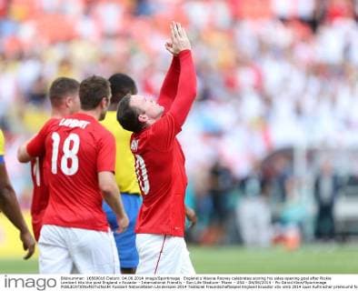 England s Wayne Rooney celebrates scoring his sides opening goal after Rickie Lambert hits the post England v Ecuador - International Friendly - Sun Life Stadium- Miami - USA - 04 06 2014 - Pic David Klein Sportimage EDITORIAL USE ONLY. No use with unauthorised audio, video, data, fixture lists, club league logos or live services. Online in-match use limited to 120 images, no video emulation. No use in betting, games or single club league player publications.