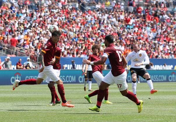 Manchester United s Wayne Rooney scoring his sides opening goal - International Champions Cup 2014 - AS Roma v Manchester United - Sports Authority Field - Denver - USA - 26th July 2014 - Picture David Klein Sportimage EDITORIAL USE ONLY. No use with unauthorised audio, video, data, fixture lists, club league logos or live services. Online in-match use limited to 120 images, no video emulation. No use in betting, games or single club league player publications.