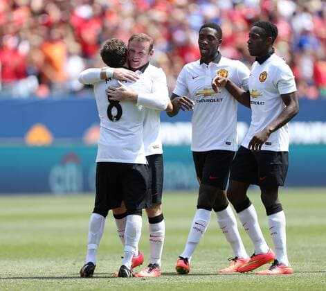 Manchester United s Wayne Rooney celebrates scoring his sides opening goal - International Champions Cup 2014 - AS Roma v Manchester United - Sports Authority Field - Denver - USA - 26th July 2014 - Picture David Klein Sportimage EDITORIAL USE ONLY. No use with unauthorised audio, video, data, fixture lists, club league logos or live services. Online in-match use limited to 120 images, no video emulation. No use in betting, games or single club league player publications.