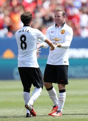 Manchester United s Wayne Rooney celebrates scoring his sides opening goal with Juan Mata - International Champions Cup 2014 - AS Roma v Manchester United - Sports Authority Field - Denver - USA - 26th July 2014 - Picture David Klein Sportimage EDITORIAL USE ONLY. No use with unauthorised audio, video, data, fixture lists, club league logos or live services. Online in-match use limited to 120 images, no video emulation. No use in betting, games or single club league player publications.
