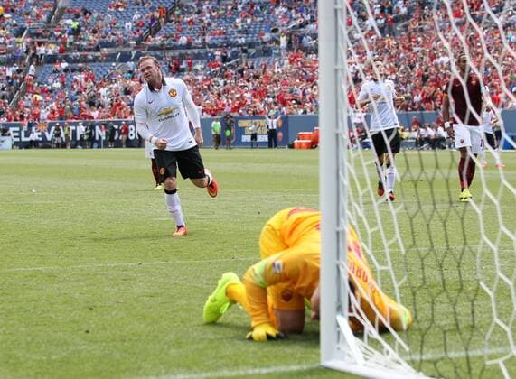 Manchester United s Wayne Rooney celebrates scoring his sides third goal - International Champions Cup 2014 - AS Roma v Manchester United - Sports Authority Field - Denver - USA - 26th July 2014 - Picture David Klein Sportimage EDITORIAL USE ONLY. No use with unauthorised audio, video, data, fixture lists, club league logos or live services. Online in-match use limited to 120 images, no video emulation. No use in betting, games or single club league player publications.