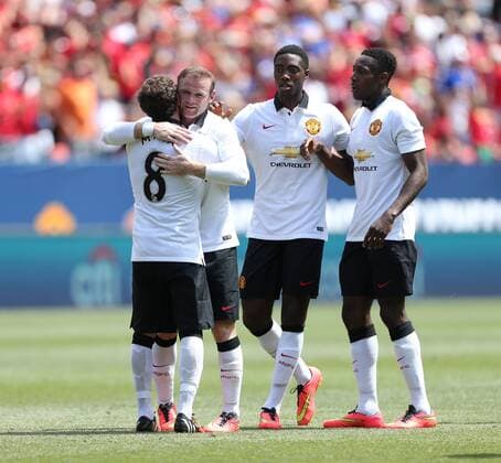 Manchester United s Wayne Rooney celebrates scoring his sides opening goal - International Champions Cup 2014 - AS Roma v Manchester United - Sports Authority Field - Denver - USA - 26th July 2014 - Picture David Klein Sportimage EDITORIAL USE ONLY. No use with unauthorised audio, video, data, fixture lists, club league logos or live services. Online in-match use limited to 120 images, no video emulation. No use in betting, games or single club league player publications.