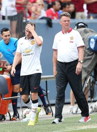 Manchester United s Louis Van Gaal looks on with Tom Cleverley - International Champions Cup 2014 - AS Roma v Manchester United - Sports Authority Field - Denver - USA - 26th July 2014 - Picture David Klein Sportimage EDITORIAL USE ONLY. No use with unauthorised audio, video, data, fixture lists, club league logos or live services. Online in-match use limited to 120 images, no video emulation. No use in betting, games or single club league player publications.