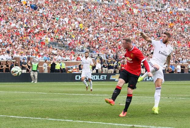 Manchester United s Wayne Rooney scoring his sides second goal - International Champions Cup 2014 - Manchester United vs Real Madrid - Michigan Stadium - Ann Arbor - USA - 2nd August 2014 - Picture David Klein Sportimage EDITORIAL USE ONLY. No use with unauthorised audio, video, data, fixture lists, club league logos or live services. Online in-match use limited to 120 images, no video emulation. No use in betting, games or single club league player publications.