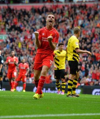 Liverpool s Jordan Henderson celebrates scoring the 4th goal- Pre Season Friendly - Liverpool vs Borussia Dortmund - Anfield Stadium - Liverpool - England - 10th August 2014 - Pic Paul Currie Sportimage EDITORIAL USE ONLY. No use with unauthorised audio, video, data, fixture lists, club league logos or live services. Online in-match use limited to 120 images, no video emulation. No use in betting, games or single club league player publications.
