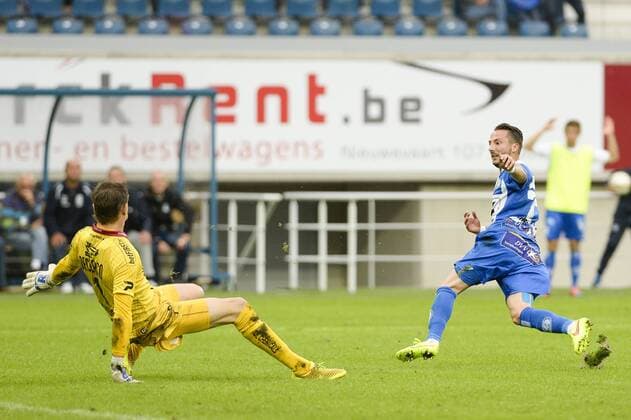 20140817 - GENT, BELGIUM: Gent s Danijel Milicevic (R) celebrates after scoring during the Jupiler Pro League match between KAA Gent and Zulte Waregem, in Gent, Sunday 17 August 2014, on day 4 of the Belgian soccer championship. LAURIExDIEFFEMBACQ 04280160