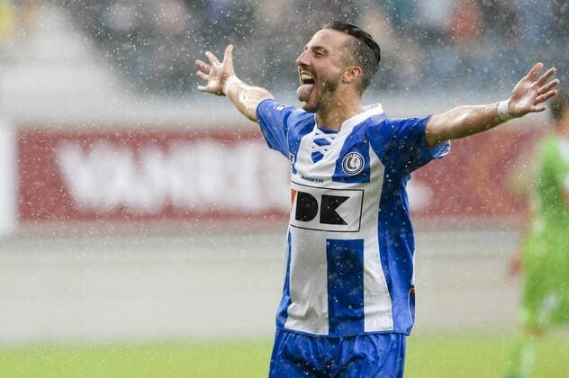 20140817 - GENT, BELGIUM: Gent s Danijel Milicevic celebrates after scoring during the Jupiler Pro League match between KAA Gent and Zulte Waregem, in Gent, Sunday 17 August 2014, on day 4 of the Belgian soccer championship. LAURIExDIEFFEMBACQ 04280371