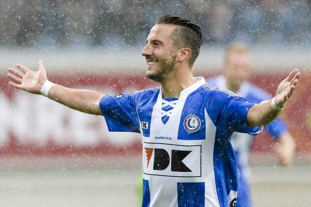 20140817 - GENT, BELGIUM: Gent s Danijel Milicevic celebrates after scoring during the Jupiler Pro League match between KAA Gent and Zulte Waregem, in Gent, Sunday 17 August 2014, on day 4 of the Belgian soccer championship. LAURIExDIEFFEMBACQ 04280374