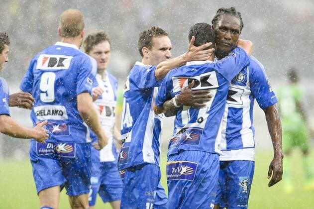 20140817 - GENT, BELGIUM: Gent s Danijel Milicevic and Gent s Habib Habibou celebrate after scoring during the Jupiler Pro League match between KAA Gent and Zulte Waregem, in Gent, Sunday 17 August 2014, on day 4 of the Belgian soccer championship. LAURIExDIEFFEMBACQ 04280386