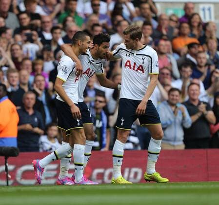 Tottenham s Nacer Chadli celebrates scoring his sides opening goal - Barclays Premier League - Tottenham vs Queens Park Rangers - White Hart Lane - London - England - 24th August 2014 - Picture David Klein Sportimage EDITORIAL USE ONLY. No use with unauthorised audio, video, data, fixture lists, club league logos or live services. Online in-match use limited to 120 images, no video emulation. No use in betting, games or single club league player publications.