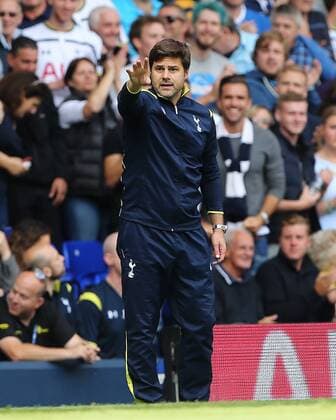 Tottenham s Mauricio Pochettino in action - Barclays Premier League - Tottenham vs Queens Park Rangers - White Hart Lane - London - England - 24th August 2014 - Picture David Klein Sportimage EDITORIAL USE ONLY. No use with unauthorised audio, video, data, fixture lists, club league logos or live services. Online in-match use limited to 120 images, no video emulation. No use in betting, games or single club league player publications.