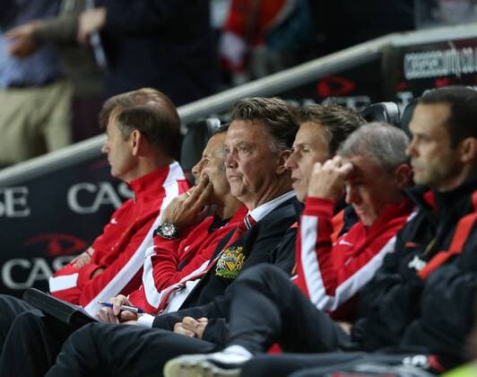Manchester United s Louis Van Gaal looks on dejected - Capital One Cup, Second Round - MK Dons Stadium - Milton Keynes - England - 26th August 2014 - Picture David Klein Sportimage EDITORIAL USE ONLY. No use with unauthorised audio, video, data, fixture lists, club league logos or live services. Online in-match use limited to 120 images, no video emulation. No use in betting, games or single club league player publications.