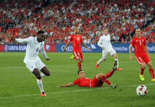 England s Danny Welbeck scoring his sides opening goal - Euro 2016 Qualifier Group E - Switzerland Vs England - St Jakob Park - Switzerland - 8th September 2014 - Picture David Klein Sportimage EDITORIAL USE ONLY. No use with unauthorised audio, video, data, fixture lists, club league logos or live services. Online in-match use limited to 120 images, no video emulation. No use in betting, games or single club league player publications.