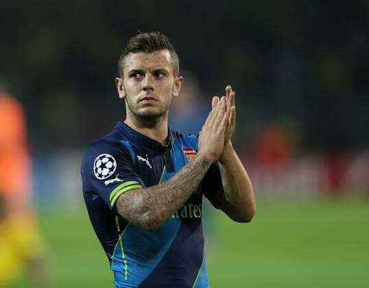 Arsenal s Jack Wilshere looks on dejected at the final whistle - Champions League Group D - Borussia Dortmund vs Arsenal London - Signal Iduna Park - Germany - 16th September 2014 - EDITORIAL USE ONLY. No use with unauthorised audio, video, data, fixture lists, club league logos or live services. Online in-match use limited to 120 images, no video emulation. No use in betting, games or single club league player publications.