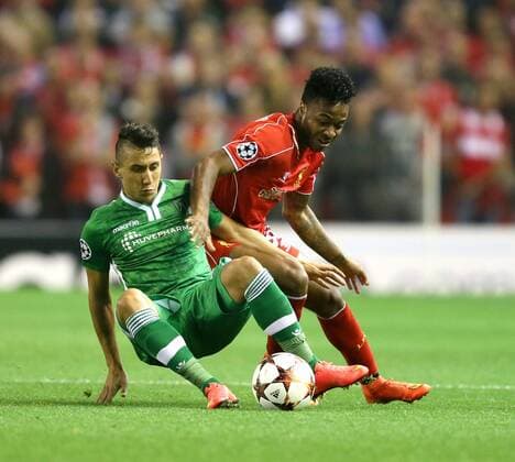 Raheem Sterling of Liverpool tussles with Mihail Aleksandrov of Ludogorets - UEFA Champions League Group B - Liverpool vs Ludogorets Razgrad - Anfield Stadium - Liverpool - England - 16th September 2014 - EDITORIAL USE ONLY. No use with unauthorised audio, video, data, fixture lists, club league logos or live services. Online in-match use limited to 120 images, no video emulation. No use in betting, games or single club league player publications.