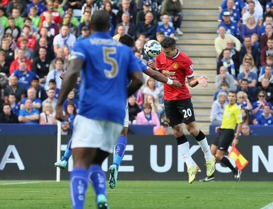 Robin van Persie of Manchester United scores the first goal - Barclays Premier League - Leicester City vs Manchester Utd - King Power Stadium - Leicester - England - 21st September 2014 - Picture Simon Bellis Sportimage EDITORIAL USE ONLY. No use with unauthorised audio, video, data, fixture lists, club league logos or live services. Online in-match use limited to 120 images, no video emulation. No use in betting, games or single club league player publications.