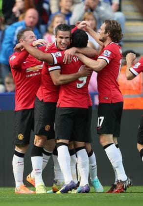 Robin van Persie of Manchester United celebrates scoring the first goal - Barclays Premier League - Leicester City vs Manchester Utd - King Power Stadium - Leicester - England - 21st September 2014 - Picture Simon Bellis Sportimage EDITORIAL USE ONLY. No use with unauthorised audio, video, data, fixture lists, club league logos or live services. Online in-match use limited to 120 images, no video emulation. No use in betting, games or single club league player publications.