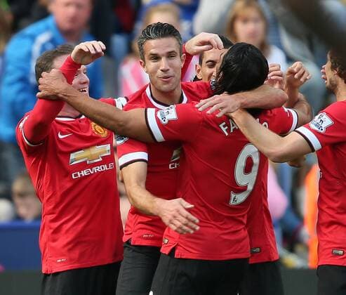 Robin van Persie of Manchester United celebrates scoring the first goal - Barclays Premier League - Leicester City vs Manchester Utd - King Power Stadium - Leicester - England - 21st September 2014 - Picture Simon Bellis Sportimage EDITORIAL USE ONLY. No use with unauthorised audio, video, data, fixture lists, club league logos or live services. Online in-match use limited to 120 images, no video emulation. No use in betting, games or single club league player publications.