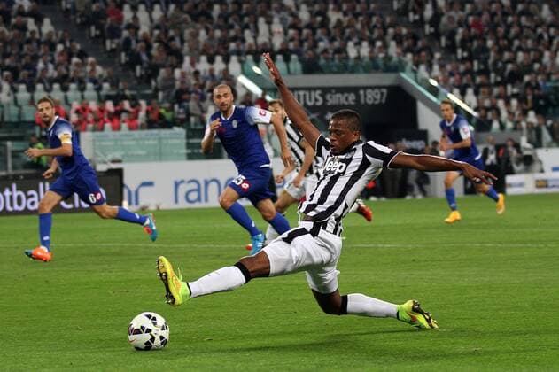 Sept. 24, 2014 - Turin, Italy - Juventus defender Patrice Evra (33) reaches for the ball during the Italian Serie A football match Juventus Vs Cesena on September 24, 2014 at Juventus Stadium in Turin. Soccer, Serie A: Juventus v Cesena - ZUMAn230