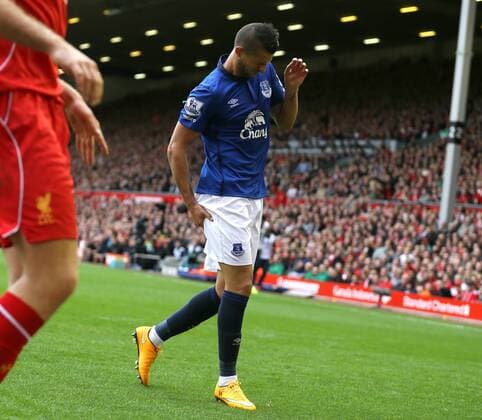 Kevin Mirallas of Everton pulls up with a hamstring problem - Barclays Premier League - Liverpool vs Everton - Anfield Stadium - Liverpool - England - 27th September 2014 - Picture Simon Bellis Sportimage EDITORIAL USE ONLY. No use with unauthorised audio, video, data, fixture lists, club league logos or live services. Online in-match use limited to 120 images, no video emulation. No use in betting, games or single club league player publications.