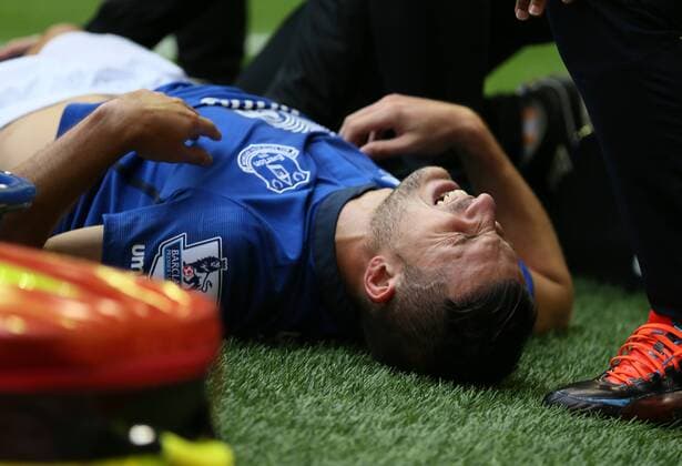 Kevin Mirallas of Everton pulls up with a hamstring problem - Barclays Premier League - Liverpool vs Everton - Anfield Stadium - Liverpool - England - 27th September 2014 - Picture Simon Bellis Sportimage EDITORIAL USE ONLY. No use with unauthorised audio, video, data, fixture lists, club league logos or live services. Online in-match use limited to 120 images, no video emulation. No use in betting, games or single club league player publications.
