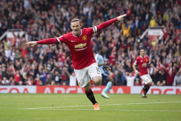 Wayne Rooney of Manchester United celebrates his opening goal - Manchester United vs. West Ham United - Barclay s Premier League - Old Trafford - Manchester - 27 09 2014 Pic Philip Oldham Sportimage EDITORIAL USE ONLY. No use with unauthorised audio, video, data, fixture lists, club league logos or live services. Online in-match use limited to 120 images, no video emulation. No use in betting, games or single club league player publications.