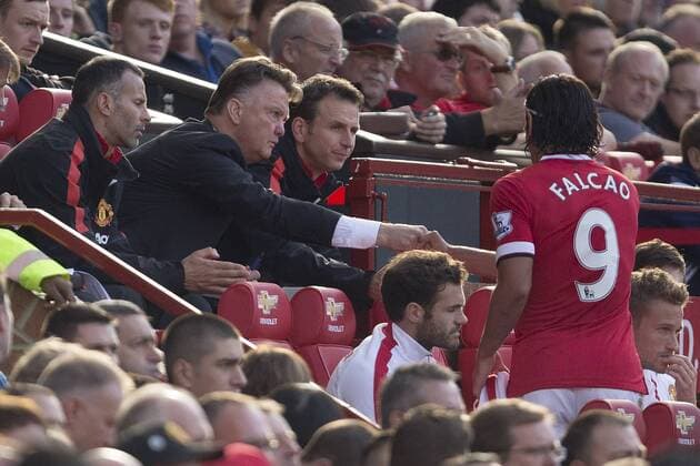 Louis Van Gaal, manager of Manchester United thanks Falcao - Manchester United vs. West Ham United - Barclay s Premier League - Old Trafford - Manchester - 27 09 2014 Pic Philip Oldham Sportimage EDITORIAL USE ONLY. No use with unauthorised audio, video, data, fixture lists, club league logos or live services. Online in-match use limited to 120 images, no video emulation. No use in betting, games or single club league player publications.