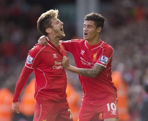 Adam Lallana of Liverpool celebrates his opening goal - FC Liverpool vs. West Bromwich Albion - Barclay s Premier League - Anfield - Liverpool - 04 10 2014 EDITORIAL USE ONLY. No use with unauthorised audio, video, data, fixture lists, club league logos or live services. Online in-match use limited to 120 images, no video emulation. No use in betting, games or single club league player publications.