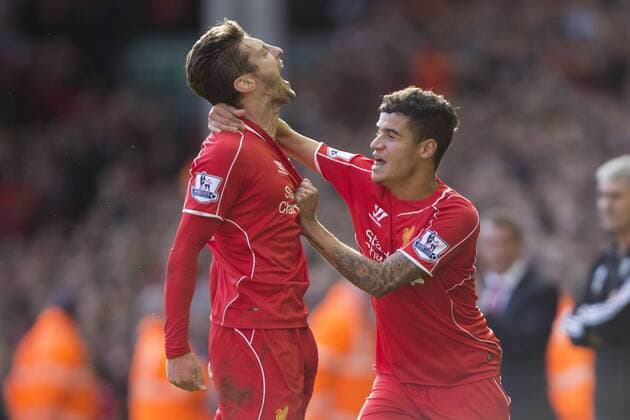 Adam Lallana of Liverpool celebrates his opening goal - FC Liverpool vs. West Bromwich Albion - Barclay s Premier League - Anfield - Liverpool - 04 10 2014 EDITORIAL USE ONLY. No use with unauthorised audio, video, data, fixture lists, club league logos or live services. Online in-match use limited to 120 images, no video emulation. No use in betting, games or single club league player publications.