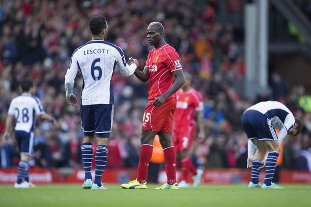 West Brom s Joleon Loscott congratulates Mario Balotelli of Liverpool at full time - Liverpool FC vs. West Bromwich Albion - Barclay s Premier League - Anfield - Liverpool - 04 10 2014 Pic PhilipxOldham Sportimage EDITORIAL USE ONLY. No use with unauthorised audio, video, data, fixture lists, club league logos or live services. Online in-match use limited to 120 images, no video emulation. No use in betting, games or single club league player publications.