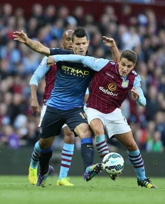 Sergio Kun Agüero of Manchester City tussles with Ashley Westwood of Aston Villa - Barclays Premier League - Aston Villa vs Manchester City - - England - 4th October 2014 - Picture SimonxBellis Sportimage EDITORIAL USE ONLY. No use with unauthorised audio, video, data, fixture lists, club league logos or live services. Online in-match use limited to 120 images, no video emulation. No use in betting, games or single club league player publications.
