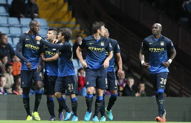 Yaya Toure of Manchester City (l) celebrates scoring the first goal - Barclays Premier League - Aston Villa vs Manchester City - - England - 4th October 2014 - Picture SimonxBellis Sportimage EDITORIAL USE ONLY. No use with unauthorised audio, video, data, fixture lists, club league logos or live services. Online in-match use limited to 120 images, no video emulation. No use in betting, games or single club league player publications.