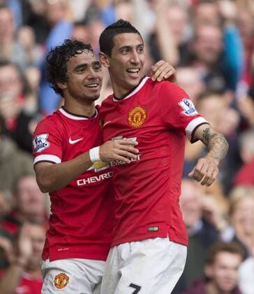 Angel di Maria of Manchester United celebrates his opening goal - Manchester United vs. Everton - Barclay s Premier League - Old Trafford - Manchester - 04 10 2014 Pic Philip Oldham Sportimage EDITORIAL USE ONLY. No use with unauthorised audio, video, data, fixture lists, club league logos or live services. Online in-match use limited to 120 images, no video emulation. No use in betting, games or single club league player publications.