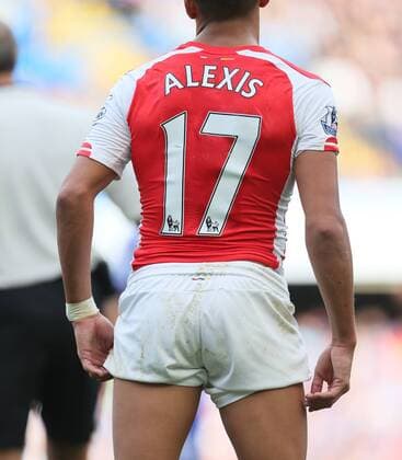 Arsenal s Alexis Sanchez with his shorts pulled up - Barclays Premier League - Chelsea Vs Arsenal - Stamford Bridge - England - 5th October 2014 - EDITORIAL USE ONLY. No use with unauthorised audio, video, data, fixture lists, club league logos or live services. Online in-match use limited to 120 images, no video emulation. No use in betting, games or single club league player publications.