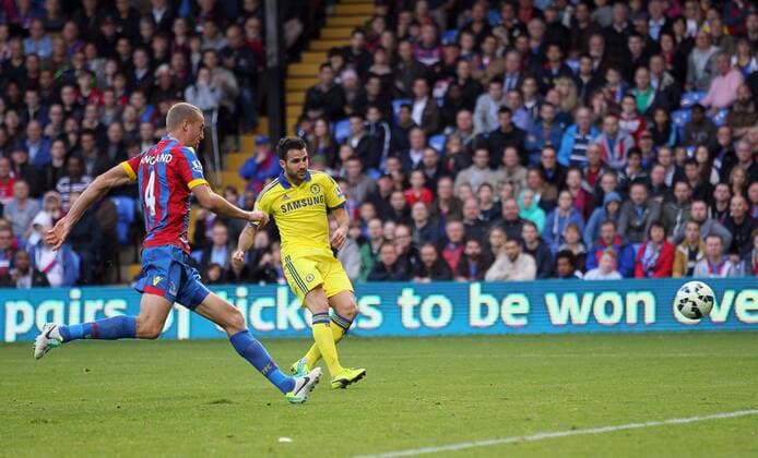 Chelsea s Cesc Fabregas scoring his sides second goal - Barclays Premier League - Crystal Palace vs Chelsea - Selhurst Park - England - 18th October 2014 - Picture David Klein Sportimage EDITORIAL USE ONLY. No use with unauthorised audio, video, data, fixture lists, club league logos or live services. Online in-match use limited to 120 images, no video emulation. No use in betting, games or single club league player publications.