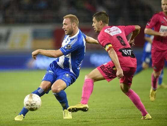 - GENT, BELGIUM: Gent s Laurent Depoitre and Charleroi s Francisco Javier Martos fight for the ball during the Jupiler Pro League match between AA Gent and Charleroi, in Gent, Saturday 18 October 2014, on day 11 of the Belgian soccer championship. JOHNxTHYS 04484835