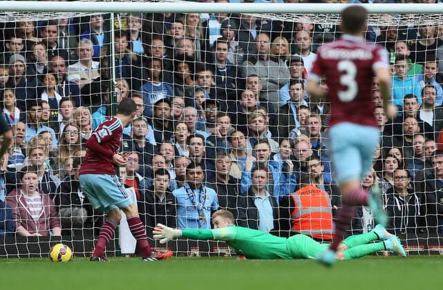 West Ham s Morgan Amalfintano scoring his sides opening goal Barclays Premier League - West Ham United vs Manchester City - Upton Park - England - 25th October 2014 - Picture David Klein Sportimage EDITORIAL USE ONLY. No use with unauthorised audio, video, data, fixture lists, club league logos or live services. Online in-match use limited to 120 images, no video emulation. No use in betting, games or single club league player publications.