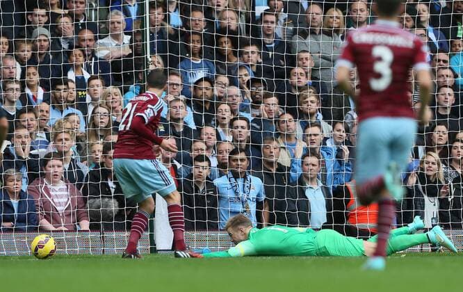 West Ham s Morgan Amalfintano scoring his sides opening goal Barclays Premier League - West Ham United vs Manchester City - Upton Park - England - 25th October 2014 - Picture David Klein Sportimage EDITORIAL USE ONLY. No use with unauthorised audio, video, data, fixture lists, club league logos or live services. Online in-match use limited to 120 images, no video emulation. No use in betting, games or single club league player publications.