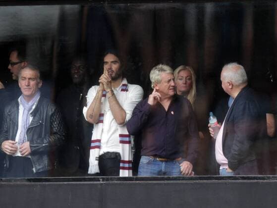 West Ham United v Manchester City . . London, UK . . 25.10.2014 Comedian Russell Brand his team West Ham United, alongside Frank McAvennie (right).