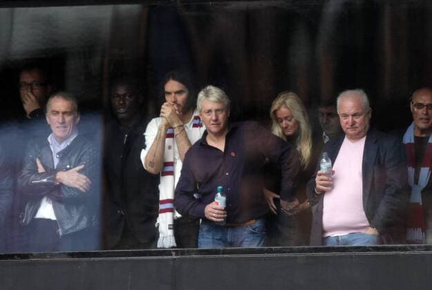 West Ham United v Manchester City . . London, UK . . 25.10.2014 Comedian Russell Brand watches his team West Ham United beside former player Frank McAvennie.