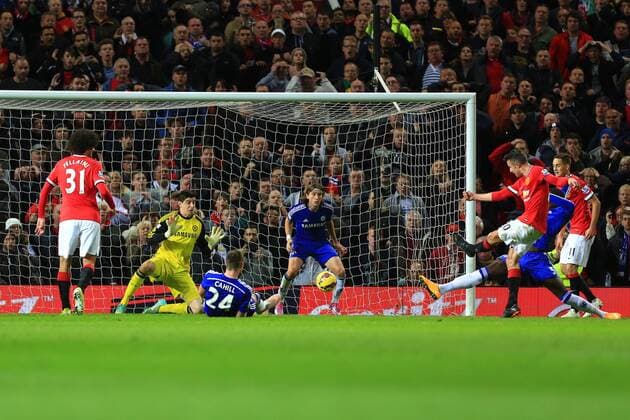 Robin van Persie of Manchester United scores in injury time to level it at 1-1 - Manchester United vs. Chelsea - Barclay s Premier League - Old Trafford - Manchester - 26 10 2014 Pic Philip Oldham Sportimage EDITORIAL USE ONLY. No use with unauthorised audio, video, data, fixture lists, club league logos or live services. Online in-match use limited to 120 images, no video emulation. No use in betting, games or single club league player publications.