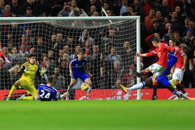 Robin van Persie of Manchester United scores in injury time to level it at 1-1 - Manchester United vs. Chelsea - Barclay s Premier League - Old Trafford - Manchester - 26 10 2014 Pic Philip Oldham Sportimage EDITORIAL USE ONLY. No use with unauthorised audio, video, data, fixture lists, club league logos or live services. Online in-match use limited to 120 images, no video emulation. No use in betting, games or single club league player publications.