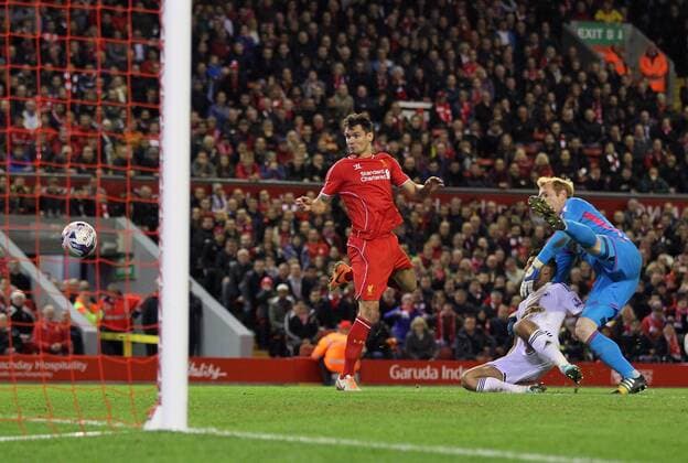 Liverpool s Dejan Lovren scoring his sides second goal League Cup Fourth Round- Liverpool vs Swansea City - Anfield - England - 28th October 2014 - Picture David Klein Sportimage EDITORIAL USE ONLY. No use with unauthorised audio, video, data, fixture lists, club league logos or live services. Online in-match use limited to 120 images, no video emulation. No use in betting, games or single club league player publications.