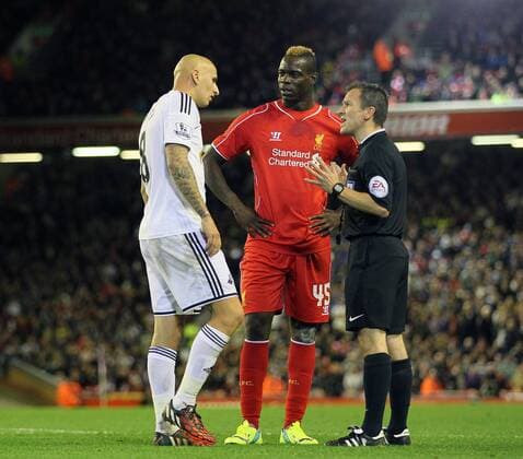 Liverpool s Mario Balotelli argues with Swansea s Jonjo Shelvey during the match League Cup Fourth Round- Liverpool vs Swansea City - Anfield - England - 28th October 2014 - Picture David Klein Sportimage EDITORIAL USE ONLY. No use with unauthorised audio, video, data, fixture lists, club league logos or live services. Online in-match use limited to 120 images, no video emulation. No use in betting, games or single club league player publications.