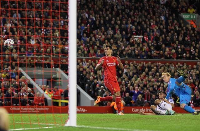 Liverpool s Dejan Lovren scoring his sides second goal League Cup Fourth Round- Liverpool vs Swansea City - Anfield - England - 28th October 2014 - Picture David Klein Sportimage EDITORIAL USE ONLY. No use with unauthorised audio, video, data, fixture lists, club league logos or live services. Online in-match use limited to 120 images, no video emulation. No use in betting, games or single club league player publications.