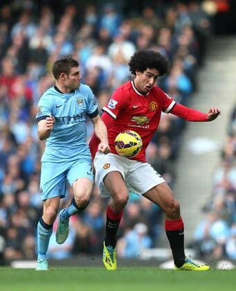 James Milner of Manchester City tussles with Mauroane Fellaini of Manchester United - Barclays Premier League - Manchester City vs Manchester Utd - Etihad Stadium - Manchester - England - 2nd November 2014 - Picture David Klein Sportimage EDITORIAL USE ONLY. No use with unauthorised audio, video, data, fixture lists, club league logos or live services. Online in-match use limited to 120 images, no video emulation. No use in betting, games or single club league player publications.